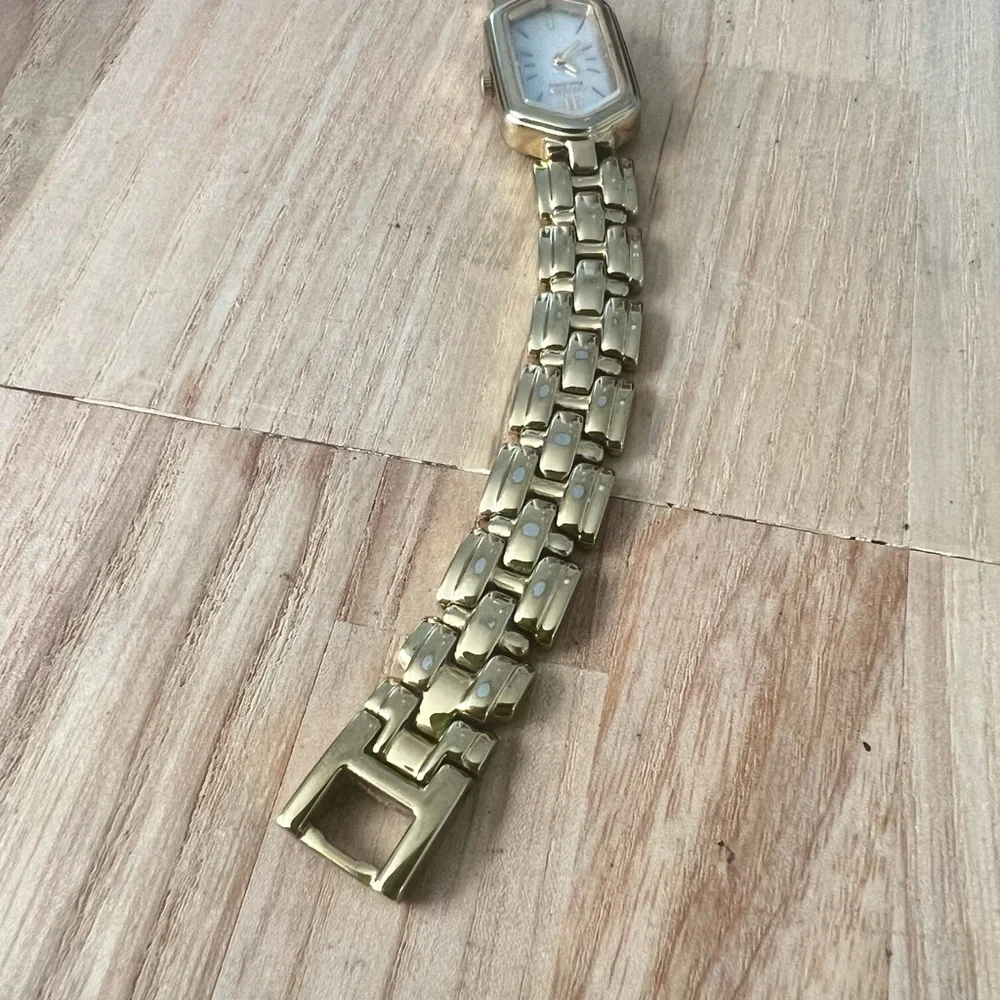 Citizen eco drive ladies gold tone hexagonal bracelet watch